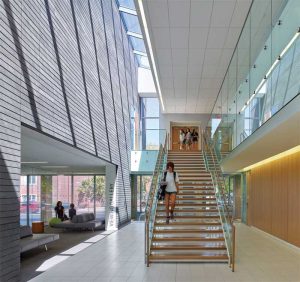 The Branksome Hall Athletics and Wellness Centre in Toronto, Canada, provides a direct connection to its surroundings with abundant daylighting and a natural palette of materials, finishes, and textiles.