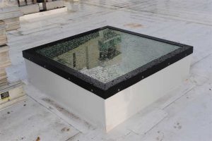 Water infiltration and condensation must be drained or weeped away from the edges of the glass to prevent detrimental freezing of the water, damaging effects of moisture on the edge seals of insulating glass, or possible debonding of interlayer material in the laminated glass. Photo courtesy Vtech Skylights