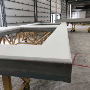 All finishes may be applied in the shop, including sheathing, insulation, barrier system, and final painting. Photo courtesy South Valley Prefab and the Association of the Wall and Ceiling Industry