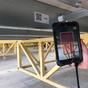 As part of the quality control and logistics process, panel tracking may be by letter, number, color-coded label, or even QR codes. Panel marking must also identify orientation and top/bottom. Photo courtesy South Valley Prefab and AWCI
