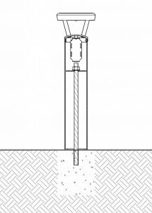 A solar bollard installed with an adhesive anchor. 