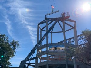 Adolfson & Peterson Construction and Northside Independent School District (ISD) top out Marshall Law and Medical Services Magnet High School in San Antonio, Texas. Photo courtesy Northside Independent School District and Adolfson & Peterson Construction.