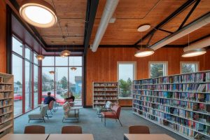 The interior shows how the entire structure of the library is made using cross-laminated timber (CLT).