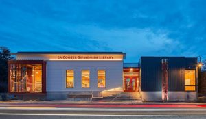 At the library’s entrance stands a traditional story pole designed and crafted specifically for the new library by Swinomish elder and master carver, Kevin Paul.