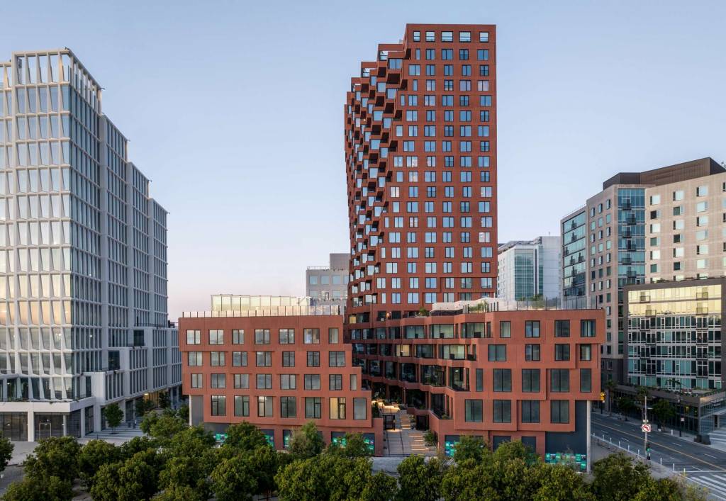 The “canyon” cuts through the building’s plinth.