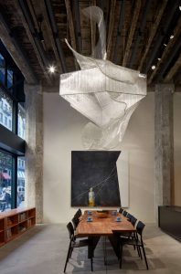 The cafe features innovative furniture and lighting.