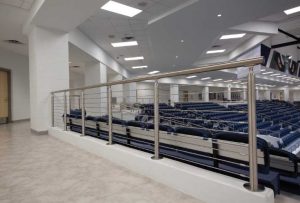 Here a cable railing is installed in an auditorium setting.