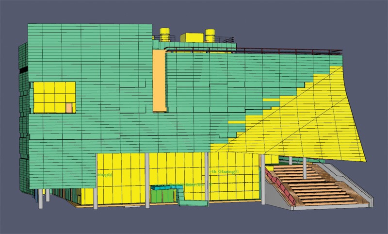 Architectural drawing of a modern building with green and yellow panels, featuring a distinctive sloped roof and an exterior staircase, against a gray background.